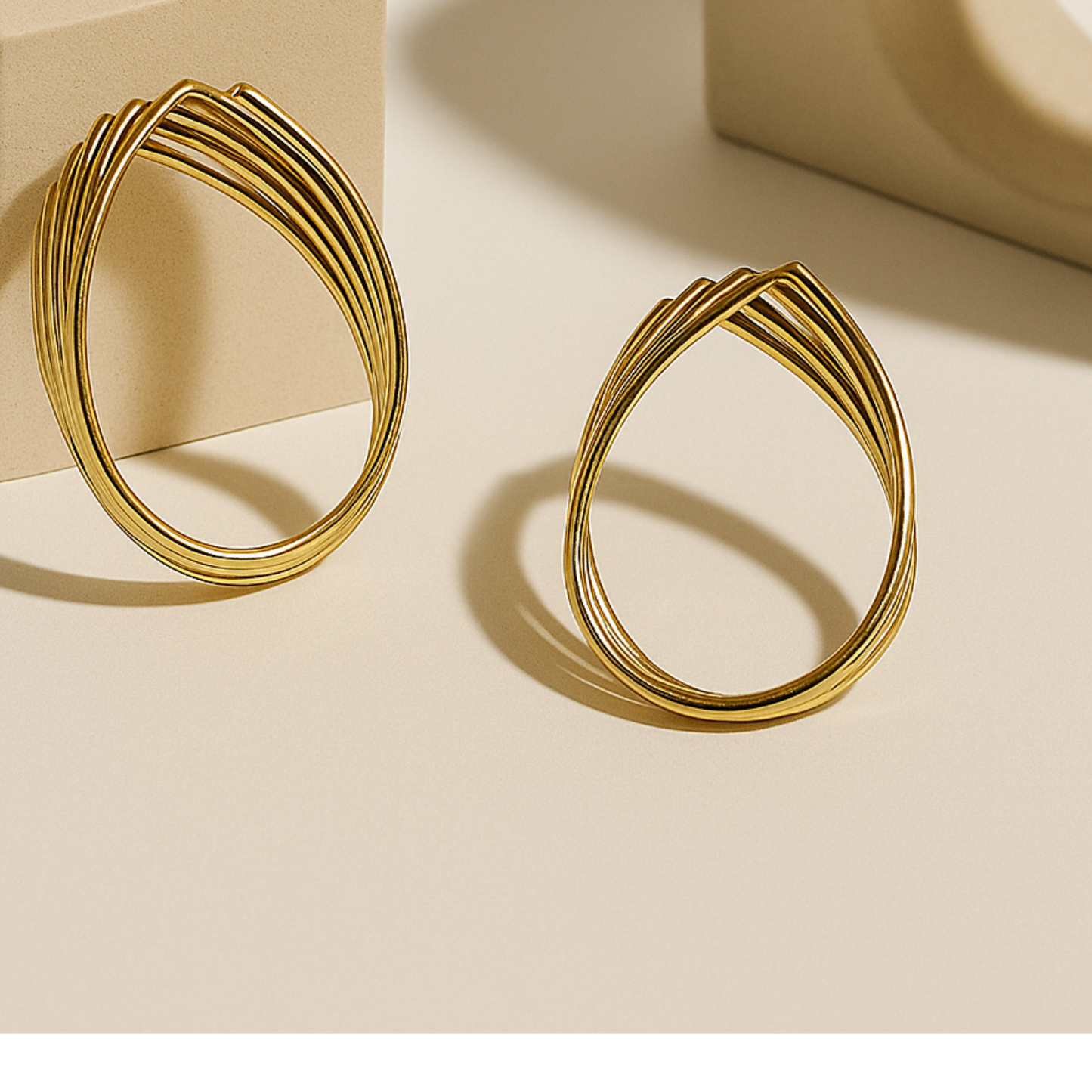 GOLD OVAL HOOP EARRING