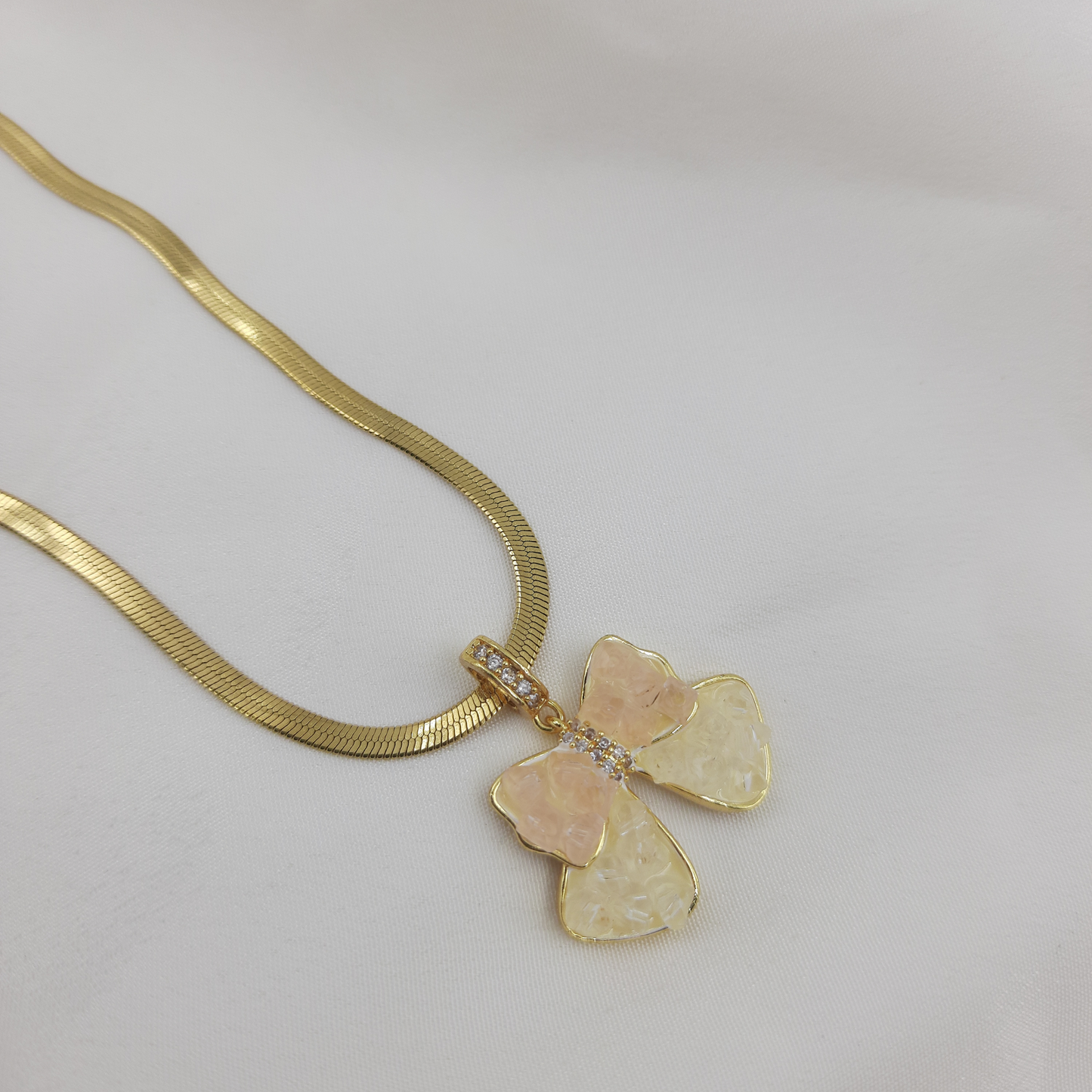 GOLD BOW PENDANT NECKLACE