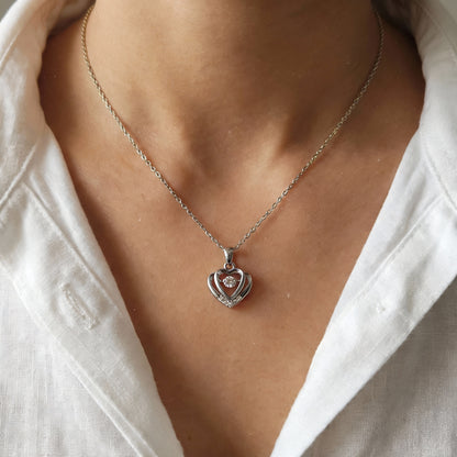 HEART PENDANT WITH SPARKLING CENTER STONE