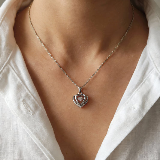 HEART PENDANT WITH SPARKLING CENTER STONE